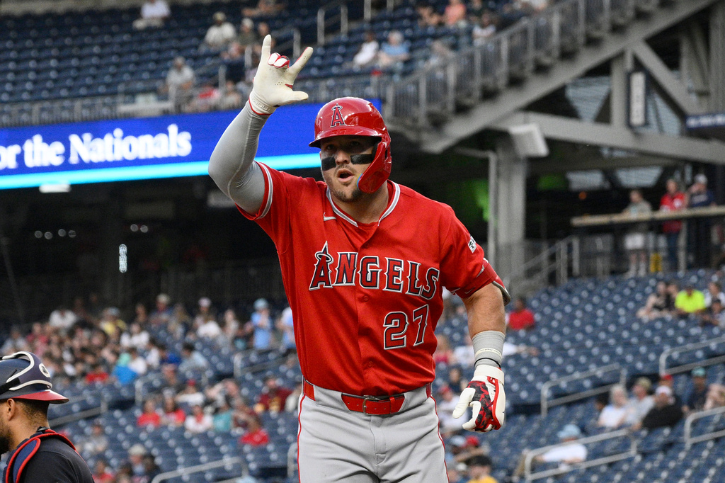 Los Angeles Angels' Mike Trout celebrates his solo home run during the first inning of a baseball game against the Washington Nationals, Friday, Sept. 11, 2026, in Washington. (AP Photo/Nick Wass)