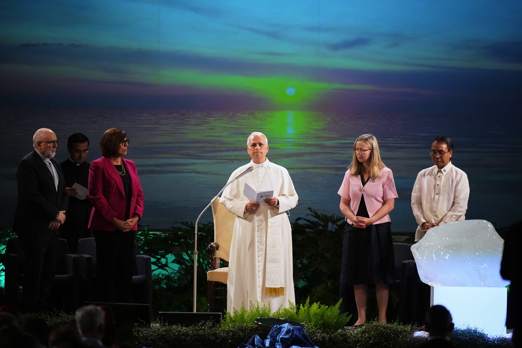 Pope Leo XIV attends the International conference "Raising Hope for Climate Justice", in Castel Gandolfo, Italy, Wednesday, Oct. 1, 2025. (AP Photo/Alessandra Tarantino)