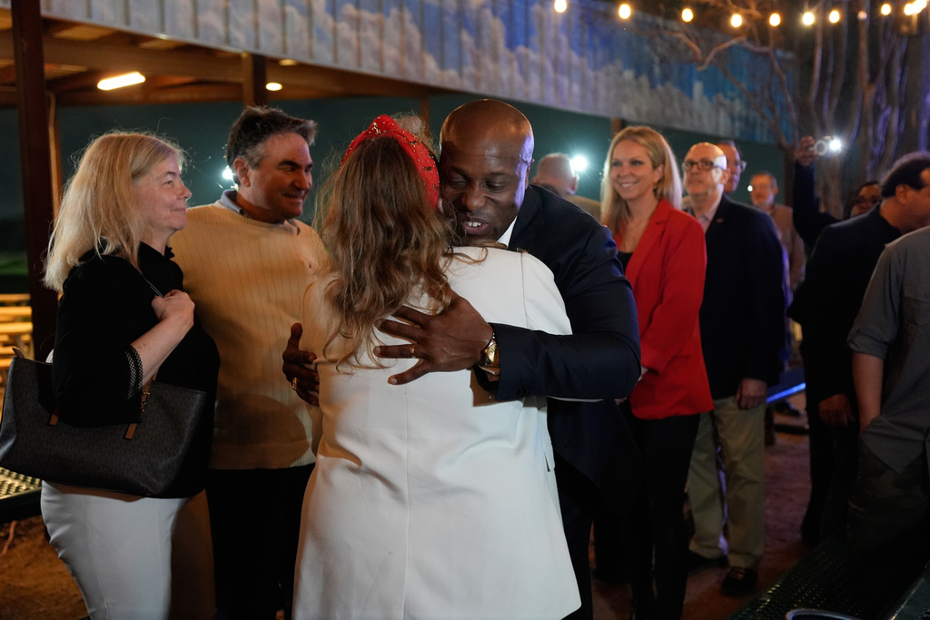 U.S. Rep. Wesley Hunt, R-Texas, a Republican candidate for the U.S. Senate greets a supporter at a primary election watch party Tuesday, March, 3, 2026 in Houston. (AP Photo/Ashley Landis)