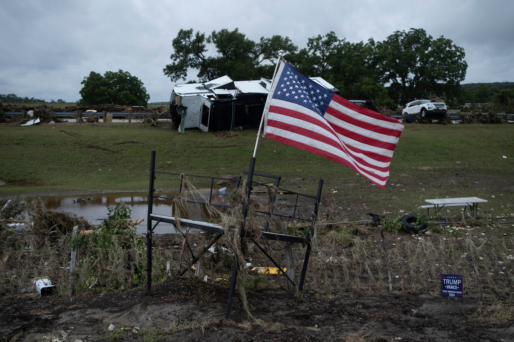 Flood debris and damage scatter the Buckhorn Lake Resort RV Park following floods along West Goat Creek near the Guadalupe River on Friday, July 17, 2026, in Kerrville, Texas. (AP Photo/Joel Angel Juarez)