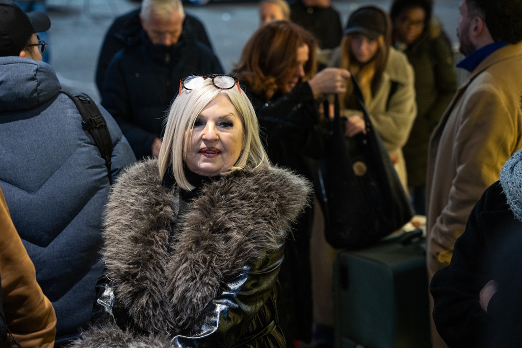 Black Friday shoppers queue up for Macy's flagship store in New York on Friday, Nov. 28, 2025. (AP Photo/Angelina Katsanis)