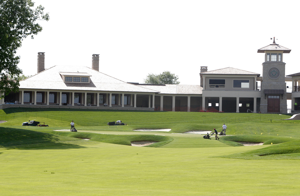 FILE - In this photo taken Wednesday, May 22, 2013, the 18th fairway of the renovated clubhouse and new clocktower are visible at Muirfield Village Golf Club in Dublin, Ohio. (AP Photo/Jay LaPrete, File)
