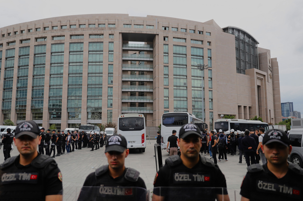Turkish police stand guard outside a courthouse after preventing LGBTQ+ rights supporters from holding a news conference in Istanbul, Turkey, Tuesday, Sept. 15, 2026. (AP Photo/Dilara Acikgoz)