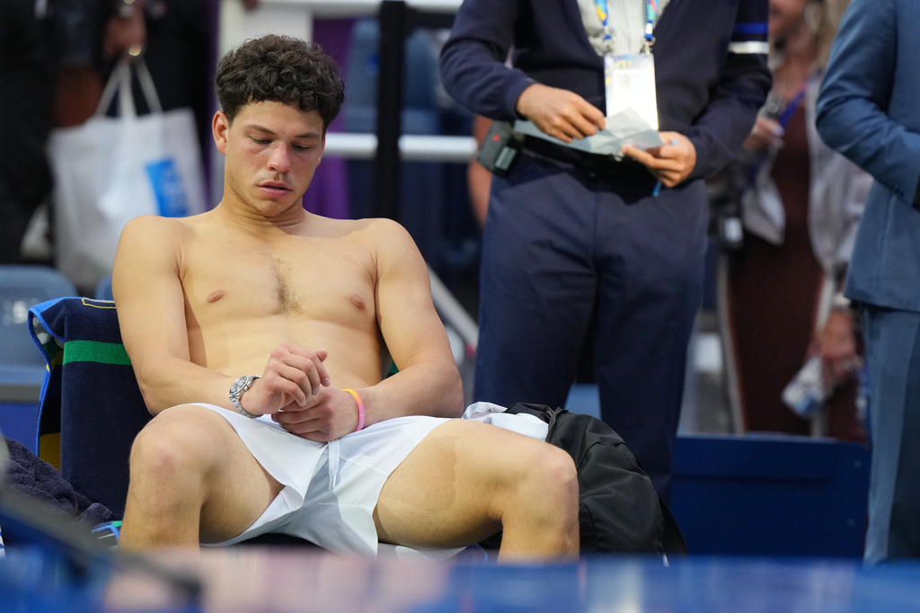 Ben Shelton, of the United States, reacts after he lost the men's singles final of the U.S. Open tennis championships against Alexander Zverev, of Germany, Sunday, Sept. 13, 2026, in New York. (AP Photo/Kirsty Wigglesworth)
