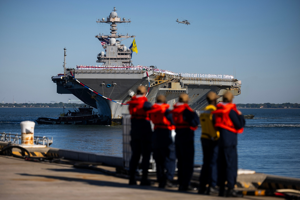The USS Gerald R. Ford pulls up to Pier 11 at Naval Station Norfolk in Norfolk, Va. on Saturday, May 16, 2026, following an 11 month deployment. (Kendall Warner/The Virginian-Pilot via AP)