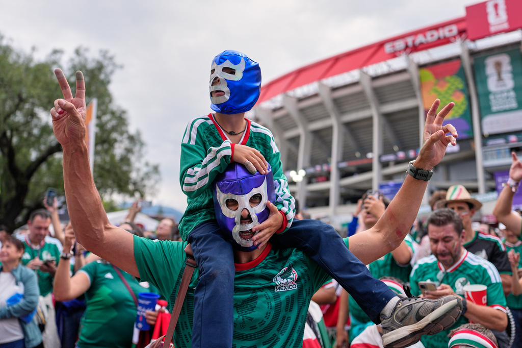 Mexico's fans celebrate outside the stadium ahead of the World Cup Group A soccer match between Czechia and Mexico in Mexico City, Wednesday, June 24, 2026. (AP Photo/Natacha Pisarenko )