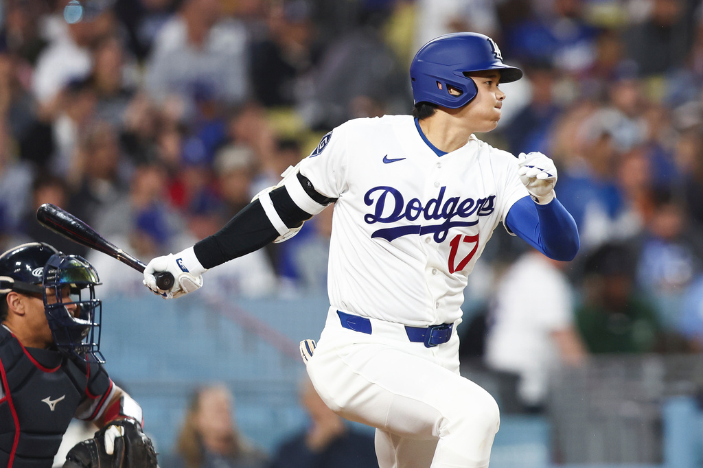 Los Angeles Dodgers' Shohei Ohtani follows through on his swing while grounding out during the third inning of a baseball game against the Atlanta Braves, Friday, May 8, 2026, in Los Angeles. (AP Photo/Jessie Alcheh)