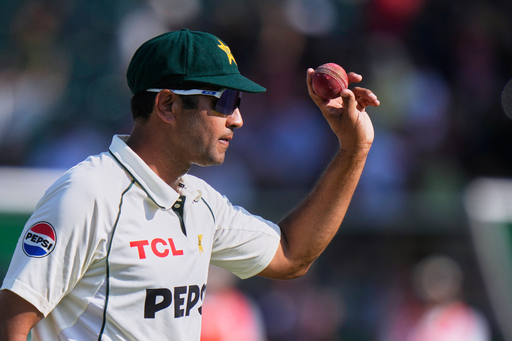 Pakistan's Asif Afridi, who took six wickets, displays the ball as he walk off the field on the end of South African first innings during the third day of the second test cricket match between Pakistan and South Africa, in Rawalpindi, Pakistan, Wednesday, Oct. 22, 2025. (AP Photo/Anjum Naveed)