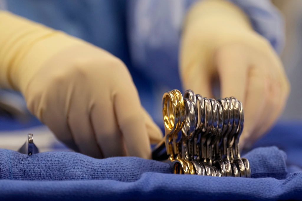 FILE - Surgical instruments are arranged during an organ procurement surgery June 15, 2023, in Tennessee. (AP Photo/Mark Humphrey, File)