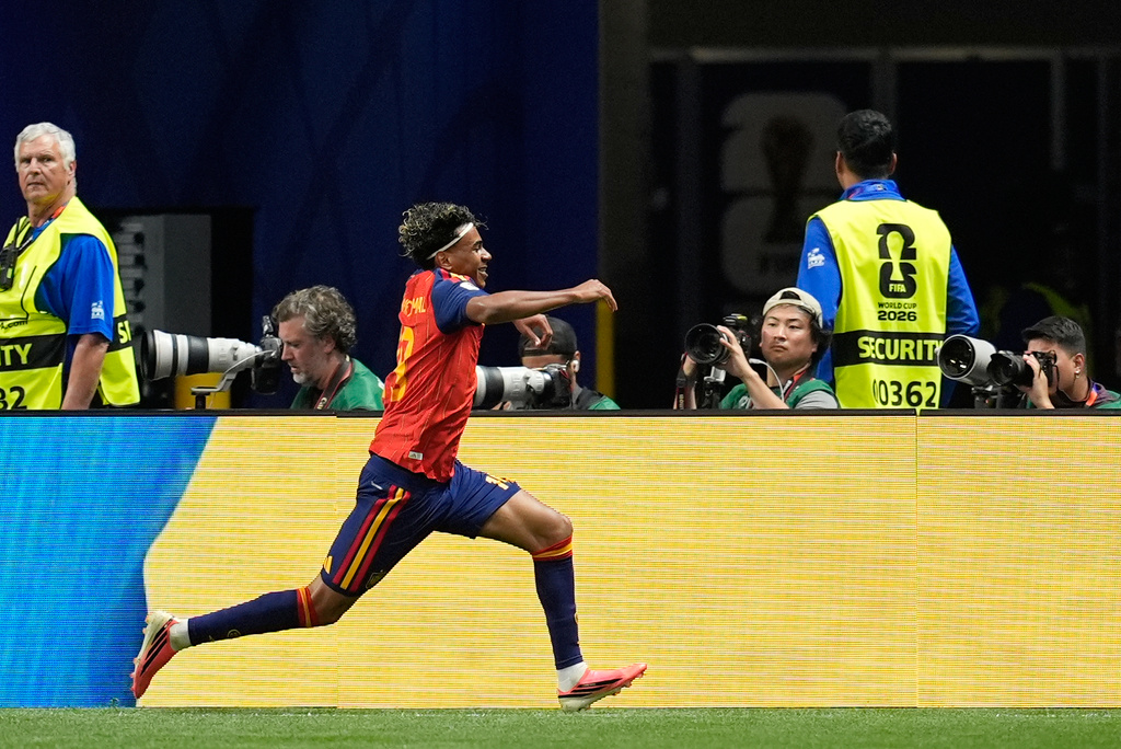 Spain's Lamine Yamal celebrates after scoring the opening goal during the World Cup Group H soccer match between Spain and Saudi Arabia in Atlanta, Sunday, June 21, 2026. (AP Photo/Mike Stewart)