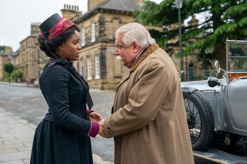 This image released by Sony Pictures Classics shows Amara Okereke, left, and Simon Russell Beale in a scene from "The Choral." (Nicola Dove/Sony Pictures Classics via AP)