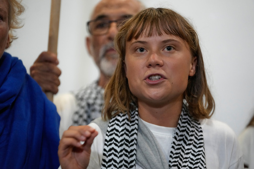 Swedish activist Greta Thunberg speaks as she arrives at the Eleftherios Venizelos International Airport in Athens, Monday, Oct. 6, 2025 after being deported from Israel for taking part in a Gaza-bound aid flottila. (AP Photo/Petros Giannakouris) Swedish activist Greta Thunberg speaks as she arrives at the Eleftherios Venizelos International Airport in Athens, Monday, Oct. 6, 2025 after being deported from Israel for taking part in a Gaza-bound aid flottila. (AP Photo/Petros Giannakouris)