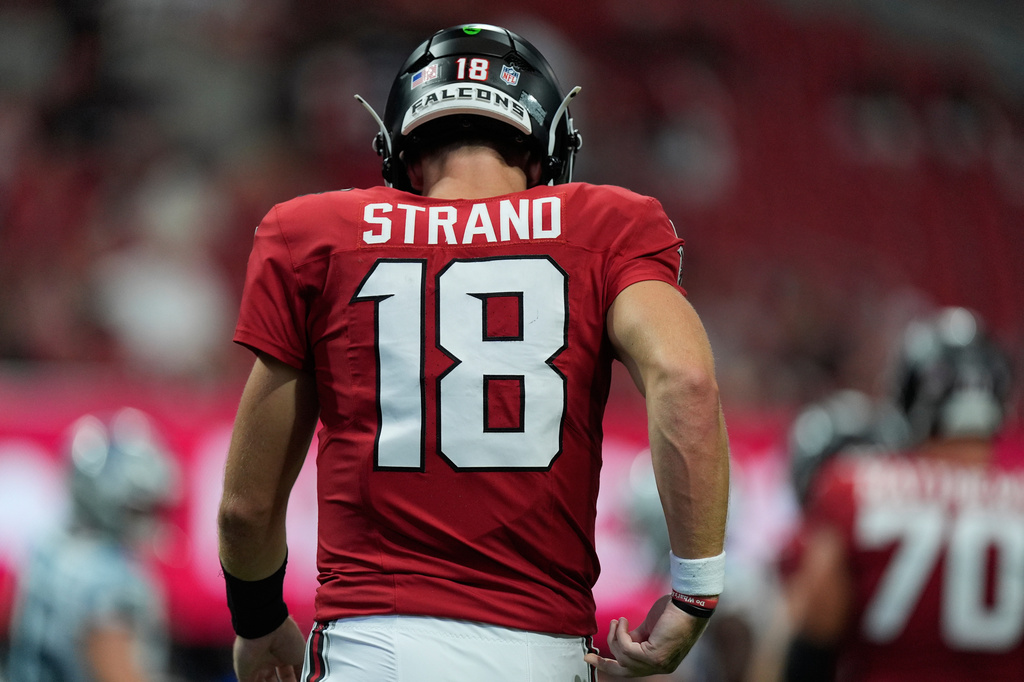 Atlanta Falcons quarterback Jack Strand (18) walks the field during an NFL football game against the Carolina Panthers in Atlanta, Sunday, Sept. 20, 2026. (AP Photo/Mike Stewart)
