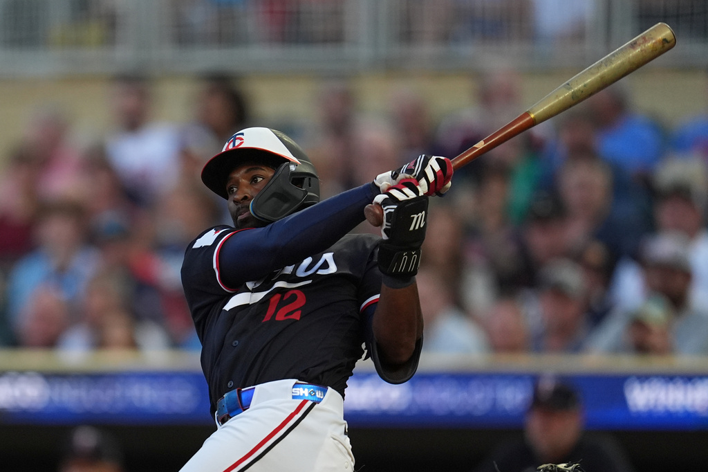Minnesota Twins shortstop Kaelen Culpepper hits a double during the third inning of a baseball game against the Detroit Tigers, Monday, Aug. 31, 2026, in Minneapolis. (AP Photo/Abbie Parr)