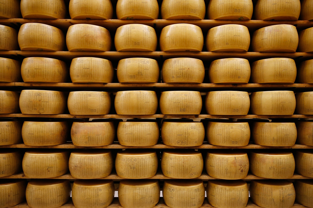 FILE - Parmigiano Reggiano Parmesan cheese wheels are stored in Noceto, near Parma, Italy, Oct. 8, 2019. (AP Photo/Antonio Calanni, File)
