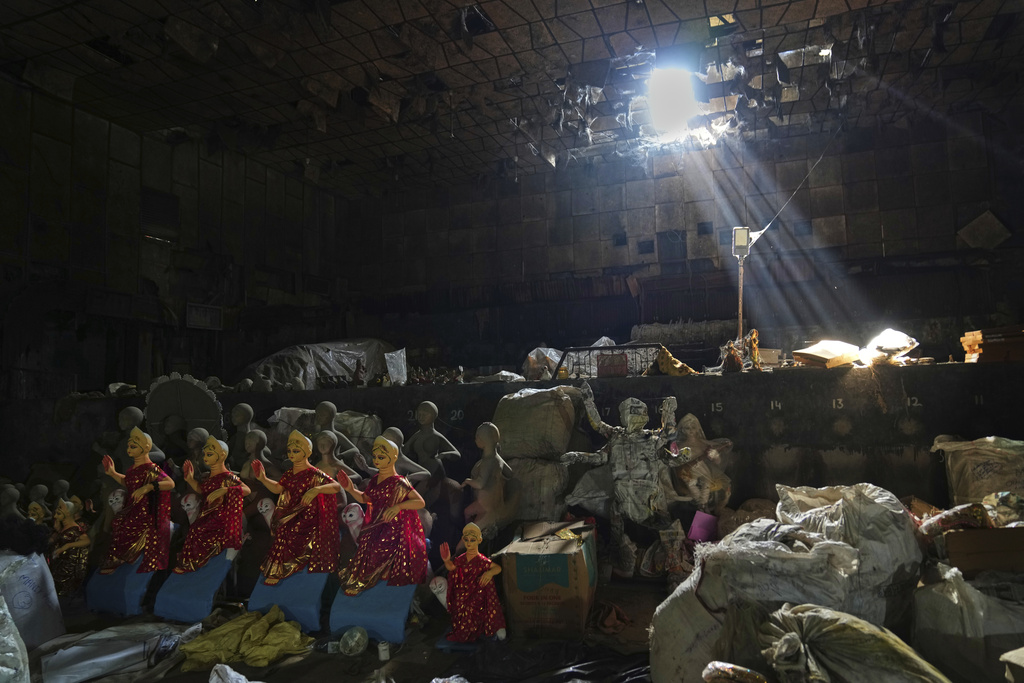 Idols of Hindu goddess Durga are kept for transportation ahead of the Durga Puja festival in New Delhi, India, Saturday, Sept. 20, 2025 (AP Photo/Manish Swarup)