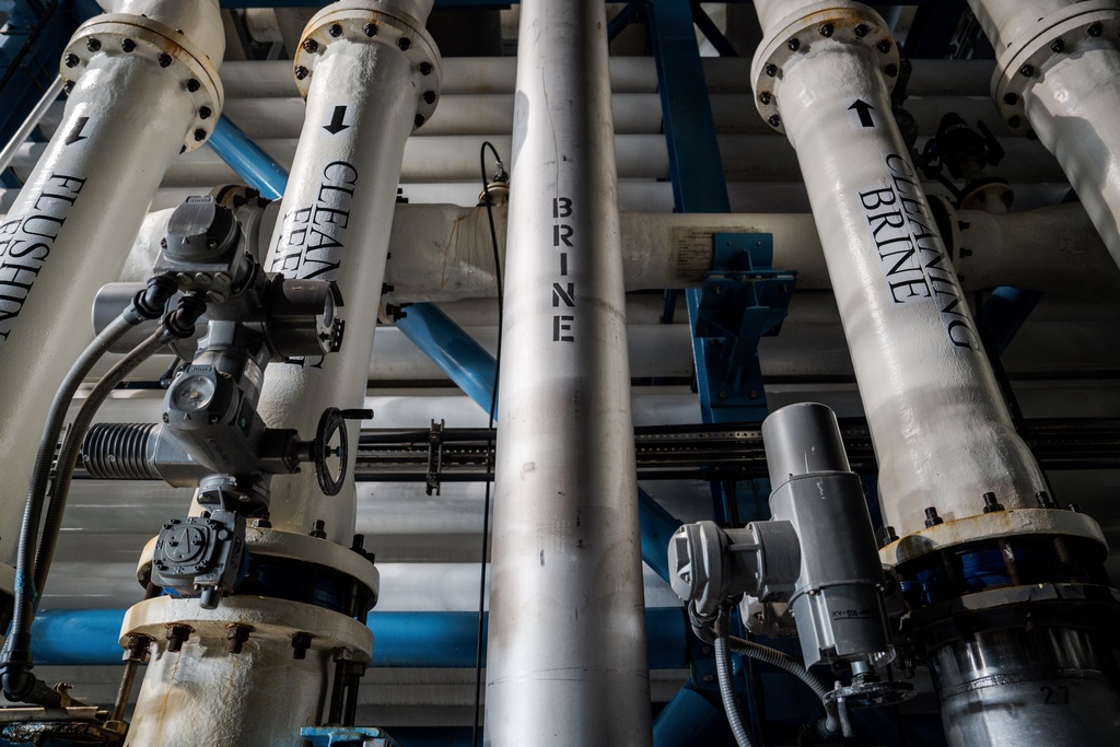 Pipes carrying brine and other substances run through the Carlsbad desalination plant in Carlsbad, Calif., Tuesday, Dec. 2, 2025. (AP Photo/Annika Hammerschlag)