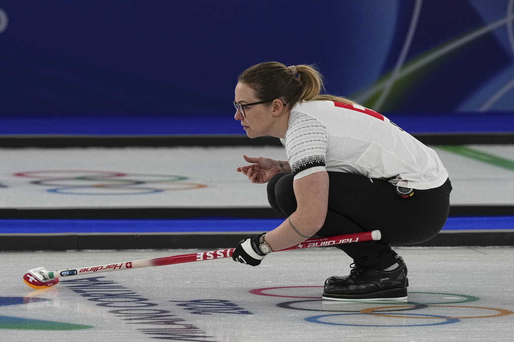 Switzerland's Alina Paetz in action during the women's curling round robin session against Sweden at the 2026 Winter Olympics, in Cortina d'Ampezzo, Italy, Monday, Feb. 16, 2026. (AP Photo/Fatima Shbair)