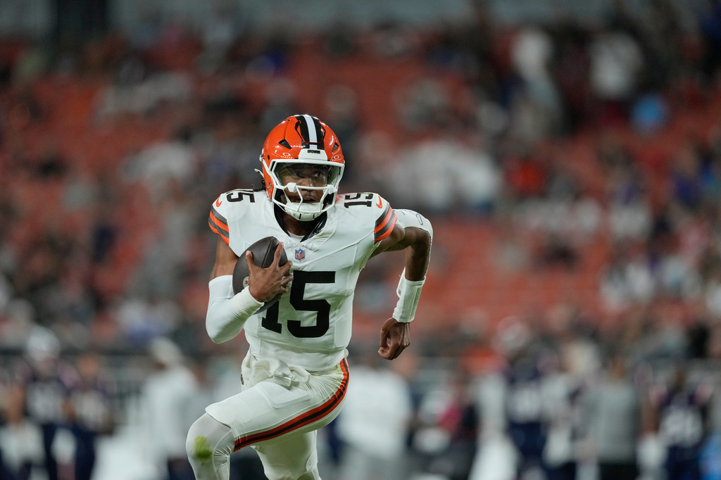 Cleveland Browns quarterback Taylen Green runs for a gain against the New England Patriots during the second half of a preseason NFL football game Thursday, Aug. 27, 2026, in Cleveland. (AP Photo/Carolyn Kaster)