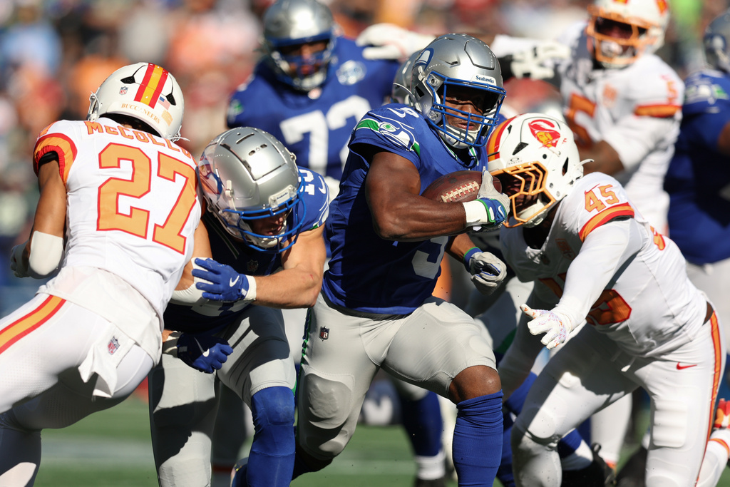 Seattle Seahawks running back Kenneth Walker III (9) runs with the ball during the second half of an NFL football game against the Tampa Bay Buccaneers, Sunday, Oct. 5, 2025, in Seattle. (AP Photo/Maddy Grassy)