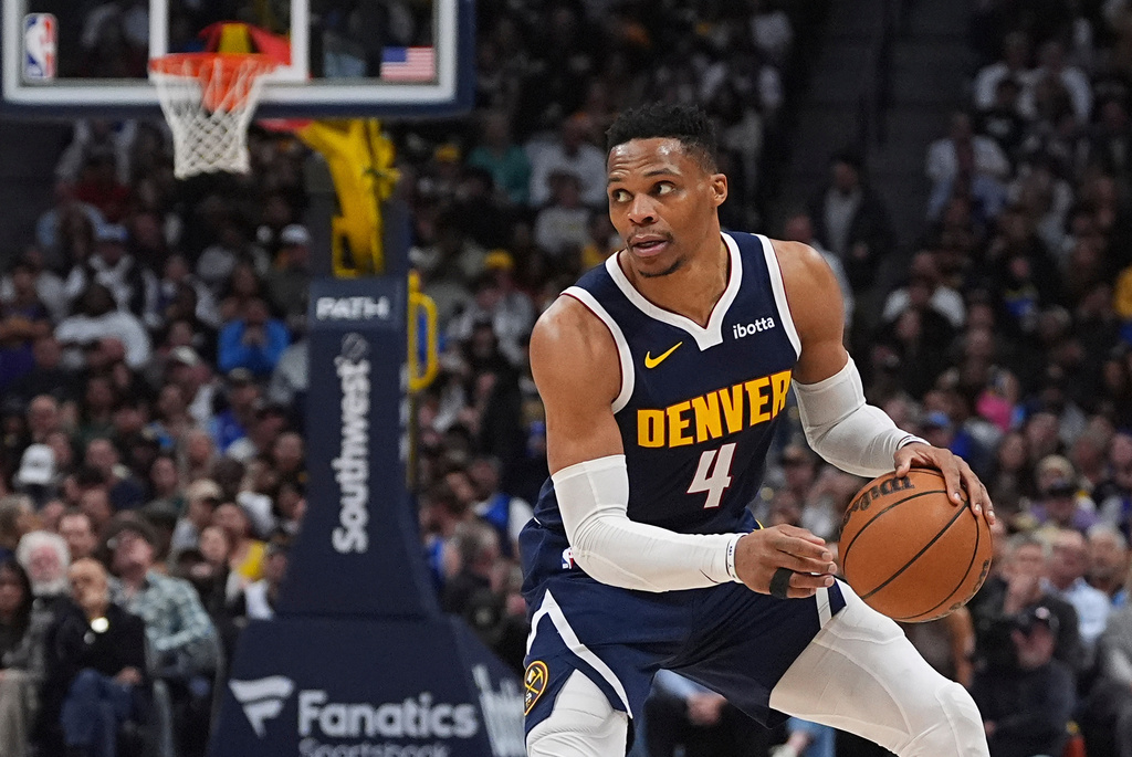 FILE - Denver Nuggets guard Russell Westbrook (4) looks to pass during the second half of an NBA basketball game Friday, March 14, 2025, in Denver. (AP Photo/David Zalubowski, File)