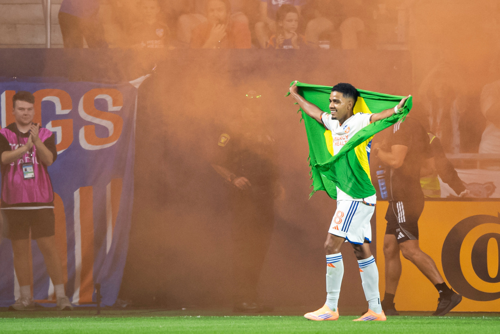 FC Cincinnati forward Brenner, front right, celebrates after scoring during the second half of an MLS soccer match against CF Montréal, Saturday, Oct. 18, 2025, in Cincinnati. (AP Photo/Tanner Pearson)