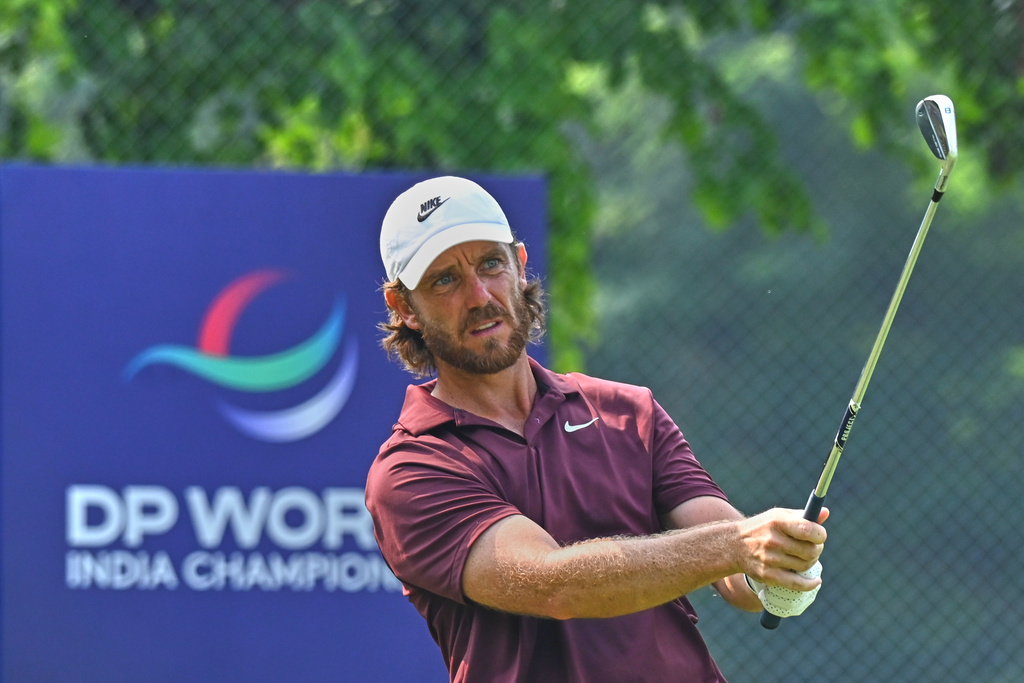 Tommy Fleetwood of England plays a shot during the DP World Tour Championship golf tournament in New Delhi, India, Saturday, Oct.18, 2025. (AP Photo/Dharam Diwakar)