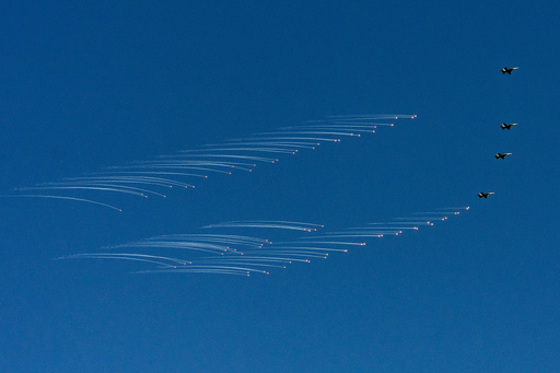 F/A-18 fighter aircraft drop bombs as President Donald Trump and first lady Melania Trump watch a naval sea power demonstration aboard the USS George H.W. Bush aircraft carrier in the Atlantic Ocean off the coast of Norfolk, Va., Oct. 5, 2025. (AP Photo/Alex Brandon) F/A-18 fighter aircraft drop bombs as President Donald Trump and first lady Melania Trump watch a naval sea power demonstration aboard the USS George H.W. Bush aircraft carrier in the Atlantic Ocean off the coast of Norfolk, Va., Oct. 5, 2025. (AP Photo/Alex Brandon)