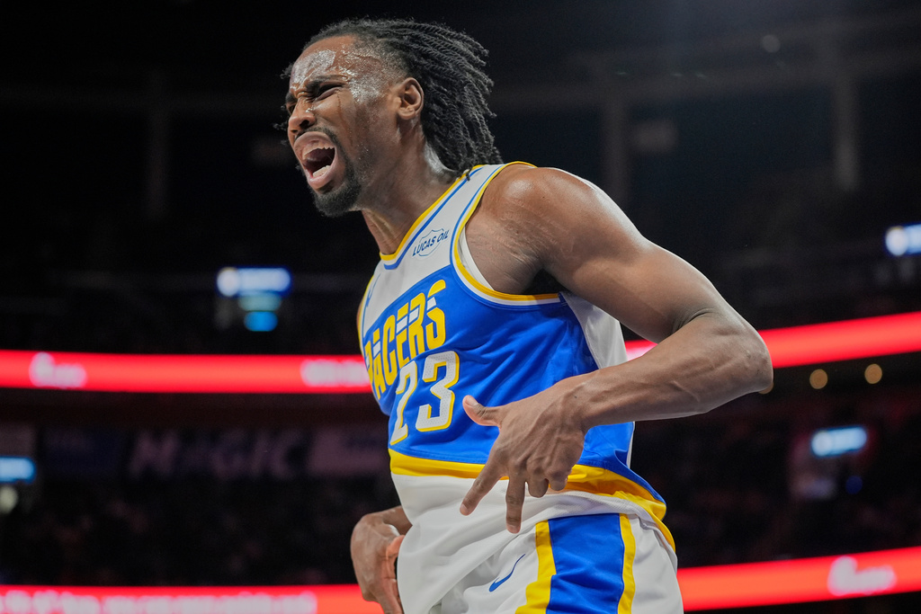 Indiana Pacers guard Aaron Nesmith (23) reacts after sinking a 3-point shot against the Orlando Magic during the second half of an NBA basketball game, Monday, March 23, 2026, in Orlando, Fla. (AP Photo/John Raoux)