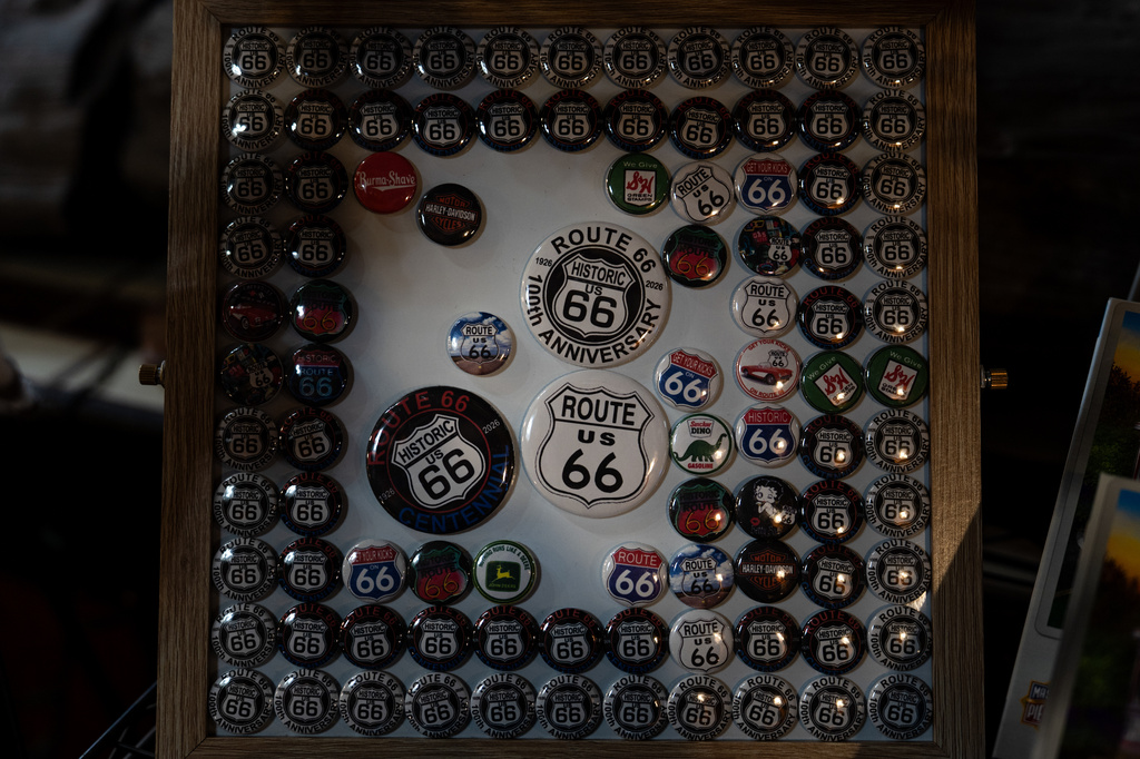 Route 66 buttons are displayed at the Wigwam Motel, a landmark on the historic highway, in Holbrook, Ariz., Wednesday, Nov. 19, 2025. (AP Photo/Jae C. Hong)