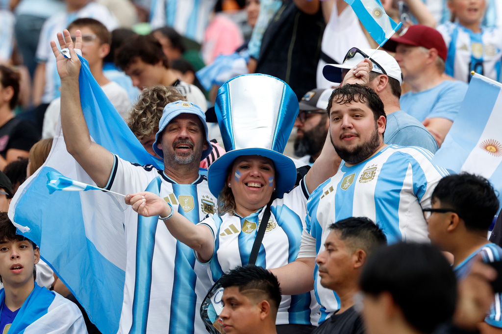 Fans cheer before the first half of an international friendly match between Argentina and Iceland, Tuesday, June 9, 2026, in Auburn, Ala. (AP Photo/Butch Dill)