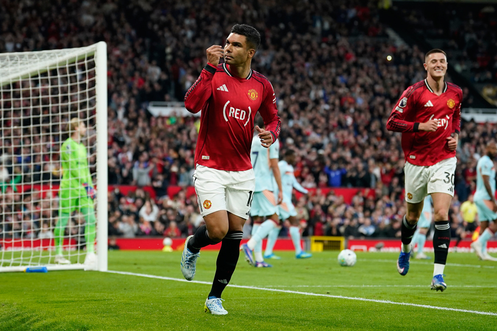 Manchester United's Casemiro celebrates after scoring during the Premier League soccer match between Manchester United and Brentford in Manchester, England, Monday, April 27, 2026. (AP Photo/Dave Thompson)