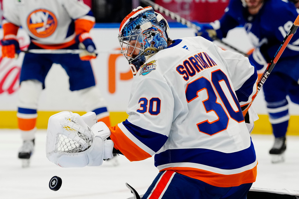 New York Islanders goaltender Ilya Sorokin (30) makes a save against the Toronto Maple Leafs during the second period of an NHL hockey game in Toronto, Saturday, Oct. 17, 2026. (Frank Gunn/The Canadian Press via AP)
