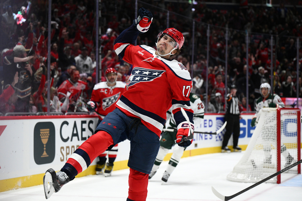 Washington Capitals center Dylan Strome (17) celebrates after his goal during the first period of an NHL hockey game against the Minnesota Wild, Friday, Oct. 17, 2025, in Washington. (AP Photo/Nick Wass)