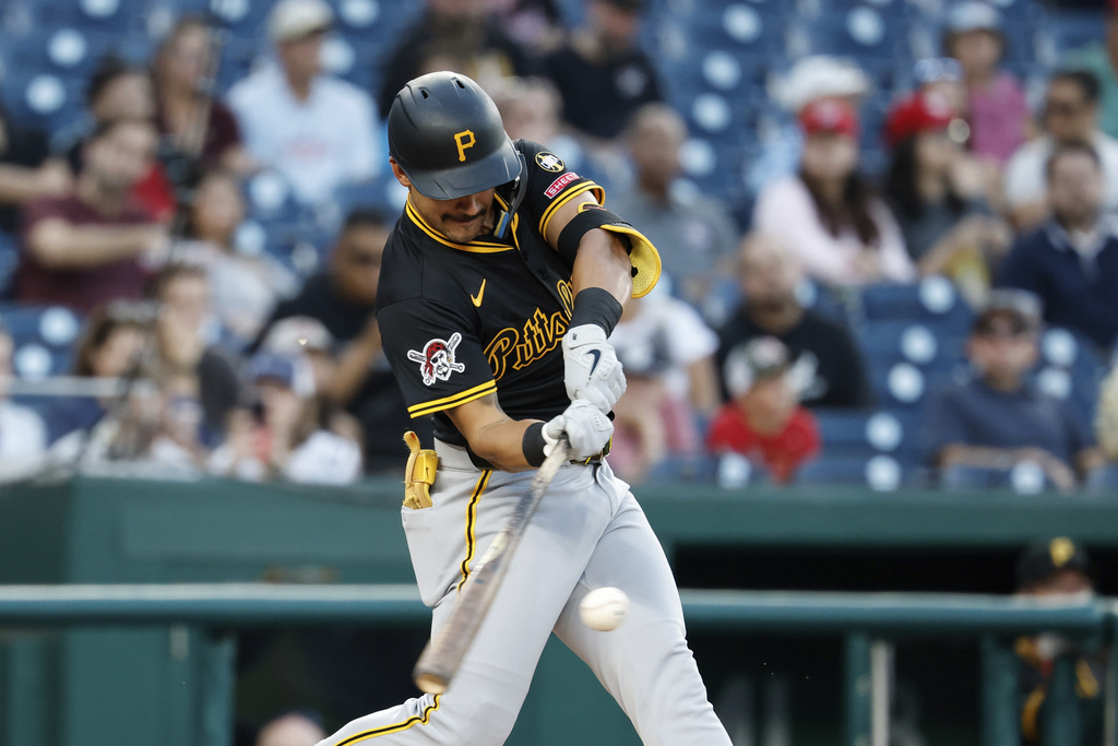 Pittsburgh Pirates' Nick Gonzales hits a single off Washington Nationals pitcher Brad Lord during the second inning of a baseball game, Friday, Sept. 12, 2025, in Washington. (AP Photo/Terrance Williams)