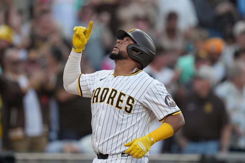 San Diego Padres' Elias Diaz celebrates after hitting a two-run home run during the second inning of a baseball game against the Arizona Diamondbacks Saturday, Sept. 27, 2025, in San Diego. (AP Photo/Gregory Bull)