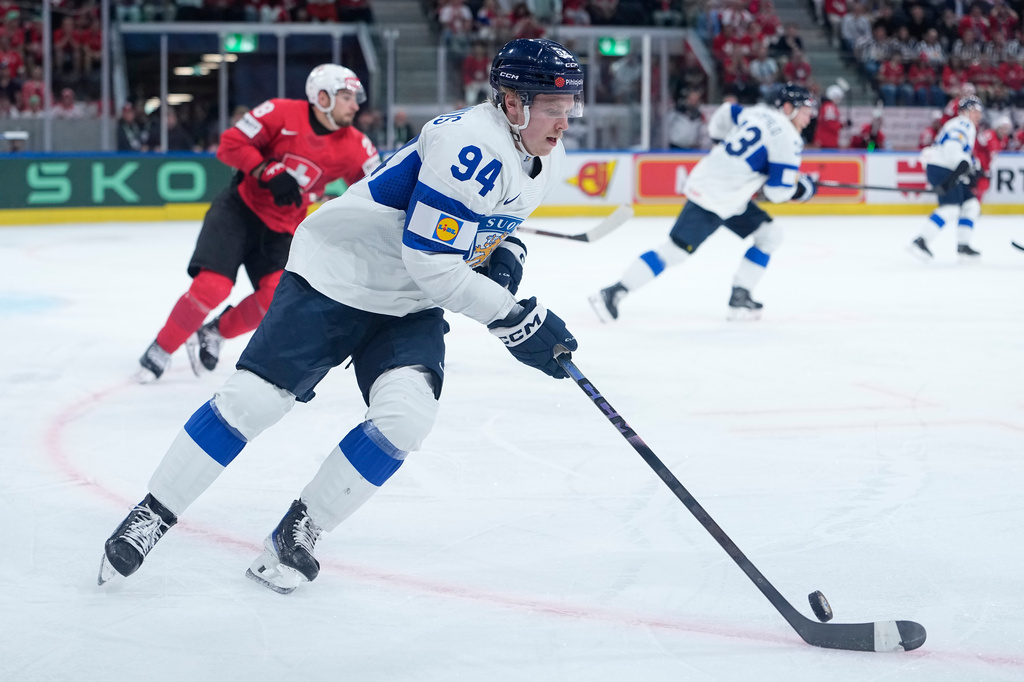 Finland's Konsta Helenius in action during the 2026 IIHF Men's Ice Hockey World Championship final match between Switzerland and Finland, in Zurich, Switzerland, Sunday, May 31, 2026. (AP Photo/Darko Bandic)