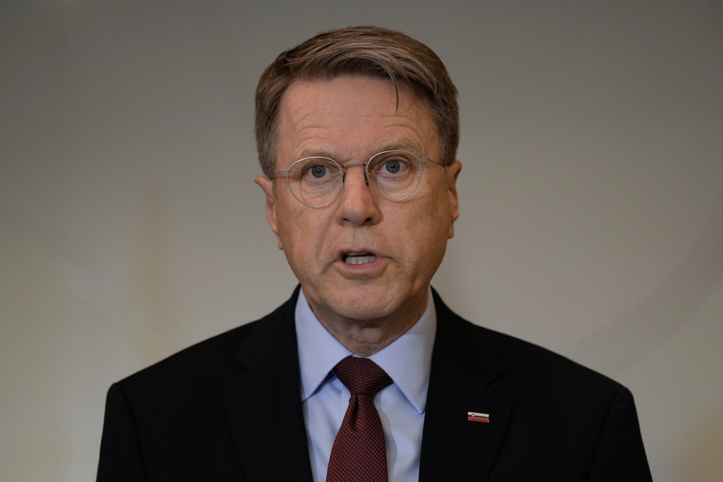 Samuel Zbogar, Slovenia's permanent representative to the United Nations and president of the Security Council, delivers a statement with his delegation in Beirut, Lebanon, Saturday, Dec. 6, 2025. (AP Photo/Bilal Hussein)
