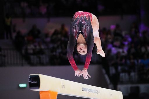 Zhang Qingying of China competes in the women's beam final during the 53rd Artistic Gymnastics World Championships in Jakarta, Indonesia, Saturday, Oct. 25, 2025. (AP Photo/Achmad Ibrahim) Zhang Qingying of China competes in the women's beam final during the 53rd Artistic Gymnastics World Championships in Jakarta, Indonesia, Saturday, Oct. 25, 2025. (AP Photo/Achmad Ibrahim)