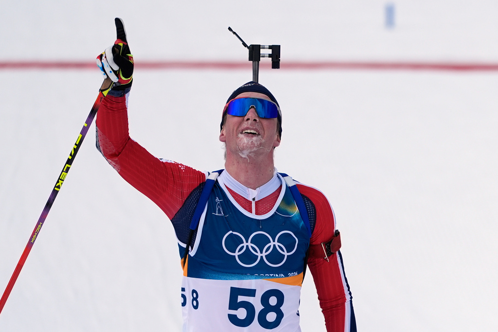 Johan-Olav Botn, of Norway, reacts after finishing the men's 20-kilometer individual biathlon race at the 2026 Winter Olympics in Anterselva, Italy, Tuesday, Feb. 10, 2026. (AP Photo/Andrew Medichini)