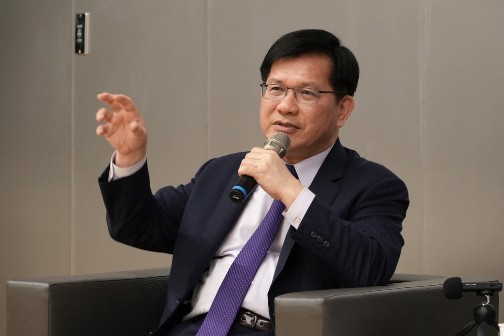 Taiwan's Foreign Minister Lin Chia-Lung speaks to reporters in Taipei city in Taiwan on Wednesday, Nov. 12, 2025. (AP Photo/Johnson Lai)