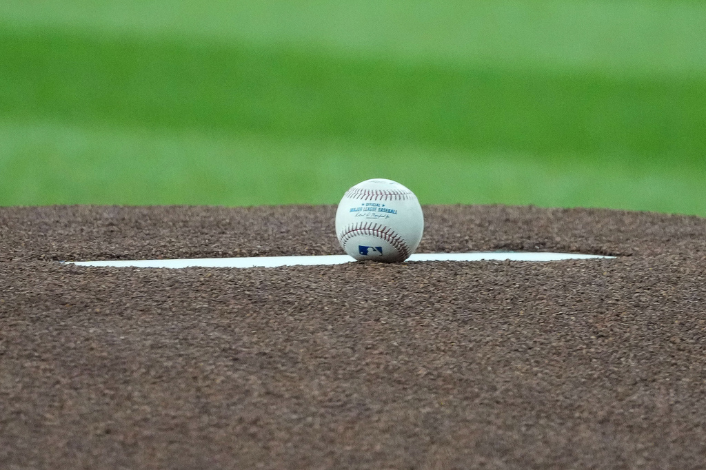 The Arizona Diamondbacks opening-day ball rests on the pitchers mound before their baseball game with the Detroit Tigers Monday, March 30, 2026, in Phoenix. (AP Photo/Darryl Webb)