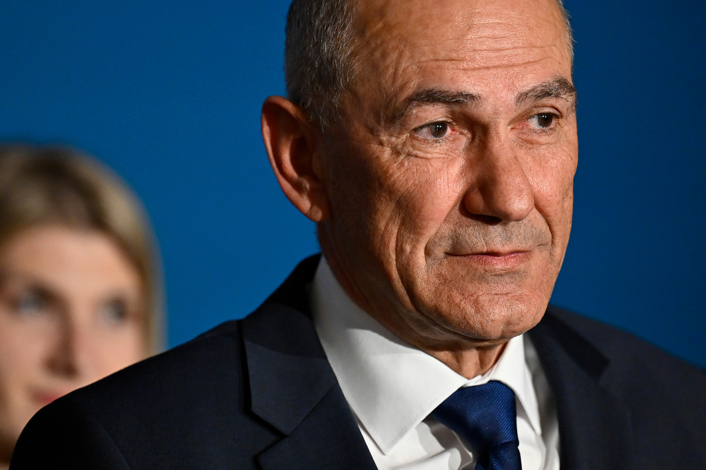 Former Prime Minister of Slovenia Janez Jansa addresses the media at the parlament in Ljubljana, Slovenia, on Sunday, March 22, 2026. (AP Photo/Denes Erdos)
