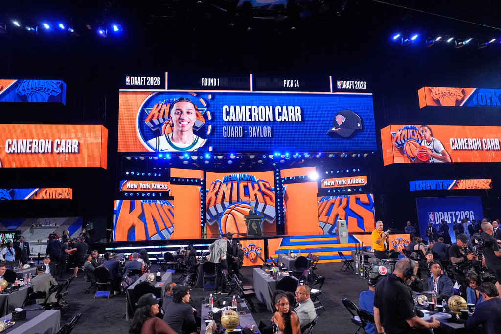 in the first round of the NBA basketball draft, Tuesday, June 23, 2026, in New York. (AP Photo/Yuki Iwamura)