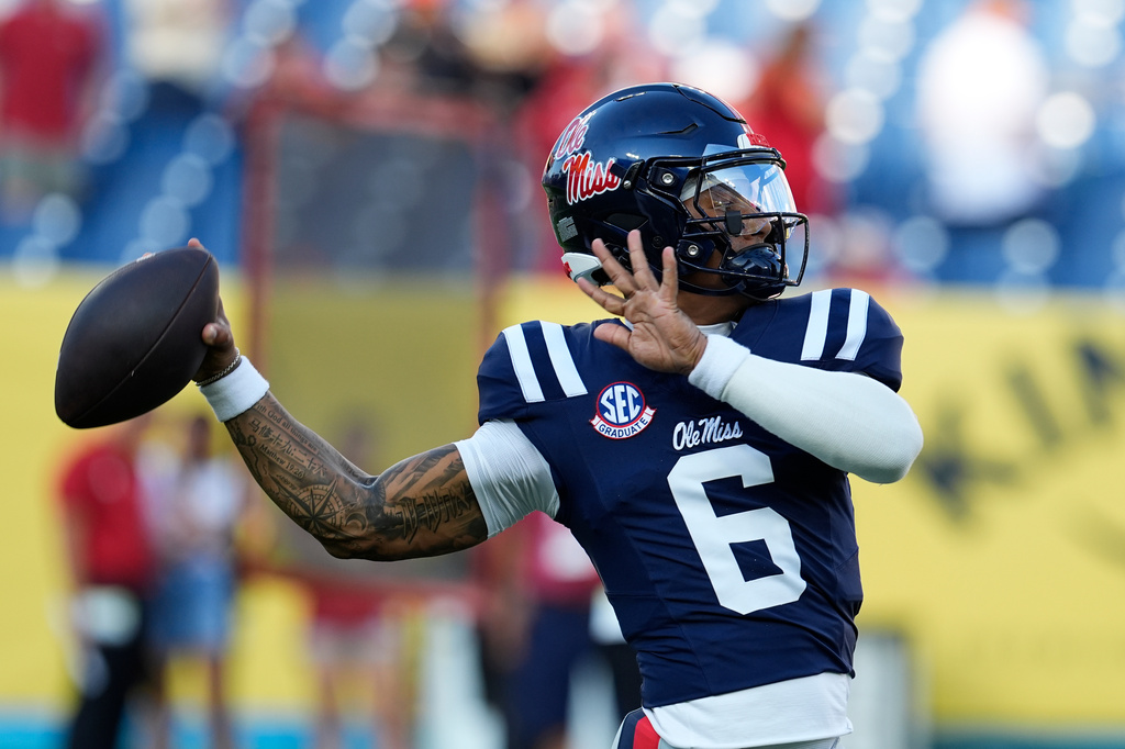 Mississippi quarterback Trinidad Chambliss (6) warms up before an NCAA college football game against Louisville, Sunday, Sept. 6, 2026, in Nashville, Tenn. (AP Photo/George Walker IV)