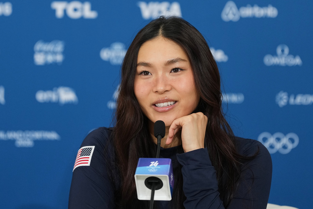 United States' Chloe Kim speaks during a press conference at the 2026 Winter Olympics, in Livigno, Italy, Monday, Feb. 9, 2026. (AP Photo/Lindsey Wasson)