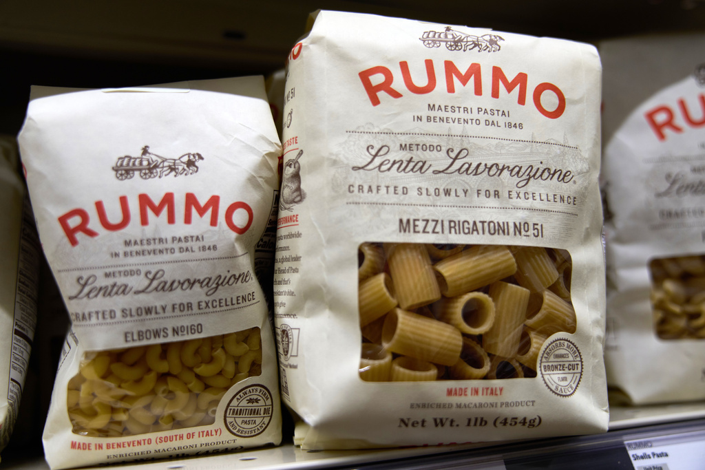 Packages of imported Italian pasta sit on shelves Tuesday, Nov. 11, 2025, in Detroit. (AP Photo/Ryan Sun)