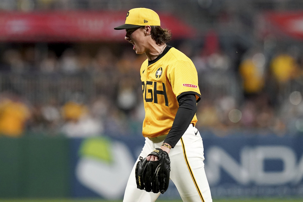 Pittsburgh Pirates pitcher Bubba Chandler reacts after getting Colorado Rockies' Mickey Moniak to strike out to end the sixth inning of a baseball game Friday, Aug. 22, 2025, in Pittsburgh. (AP Photo/Matt Freed)