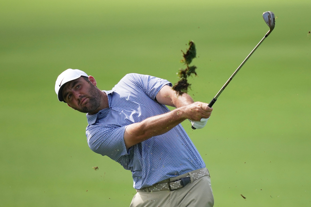 Scottie Scheffler hits from the fairway on the first hole during the first round of the Arnold Palmer Invitational at Bay Hill golf tournament Thursday, March 5, 2026, in Orlando, Fla. (AP Photo/Matt Slocum)