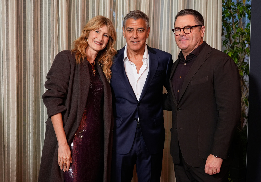Actors Laura Dern, from left, George Clooney and Nick Offerman pose together at the AFI Awards at the Four Seasons in Los Angeles, Friday, Jan. 9, 2026. (AP Photo/Chris Pizzello)